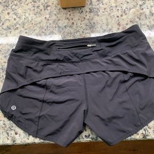 Lululemom speed up shorts size 8, 4” inseem